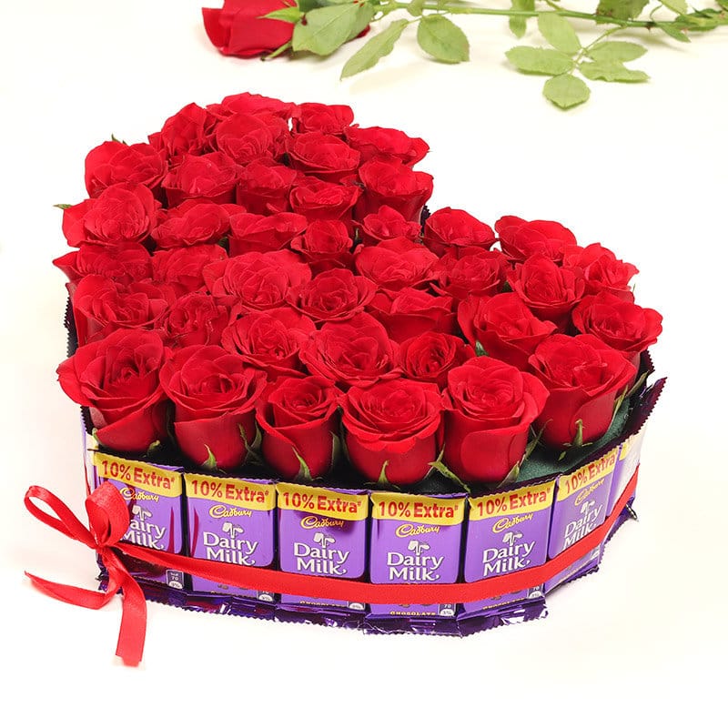 Heart shaped Roses arrangement with chocolates