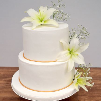 Elegant 2 Tier Cake Garnished with Flowers