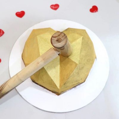 Golden Heart-Shaped Pinata Cake
