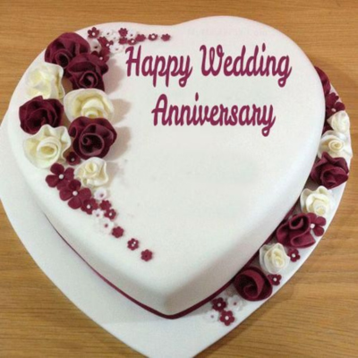 Elegant White and Purple Heart-Shaped Anniversary Cake